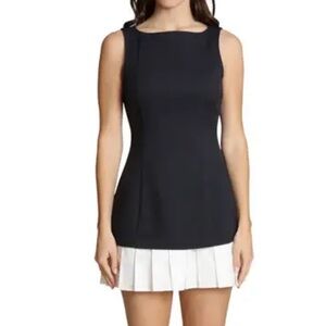 Pleated Drop Waist Mixed Media Minidress
Avec Les Filles